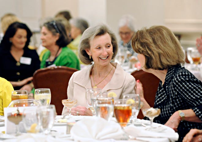 Carol Bennett (center) joins other local women at a luncheon for Women in Philanthropy at the Augusta Country Club. It is the second year the organization has awarded grants.
