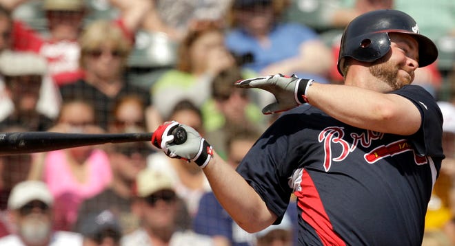 Atlanta catcher Brian McCann went 2 for 3 in Saturday's 4-0 win over the Nationals to raise his spring training batting average to .514.