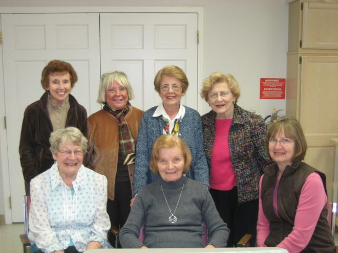 Celebrating her 80th birthday March 11 with friends, Millie Juenemann (seated, center) surrounds herself with the friends, and fellow bridge players, she grew up with. They are (seated, left to right) Jackie Brown and Anne Juenemann, her sister-in-law, and (standing, left to right) Mary Lou Young, Phyllis Holding, Jean Owens and Barb Botschner.