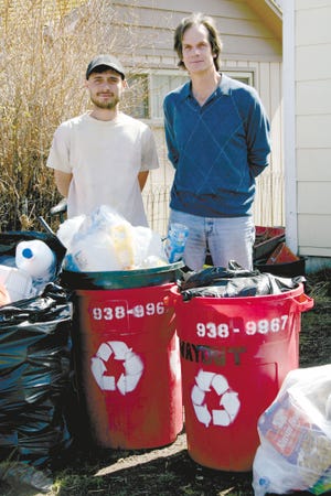 Jason Robinson and Dave Reynolds of Wayout Recycling stand with the recyclables they have accumulated in the first three weeks of collection in the Lake Shastina area.
