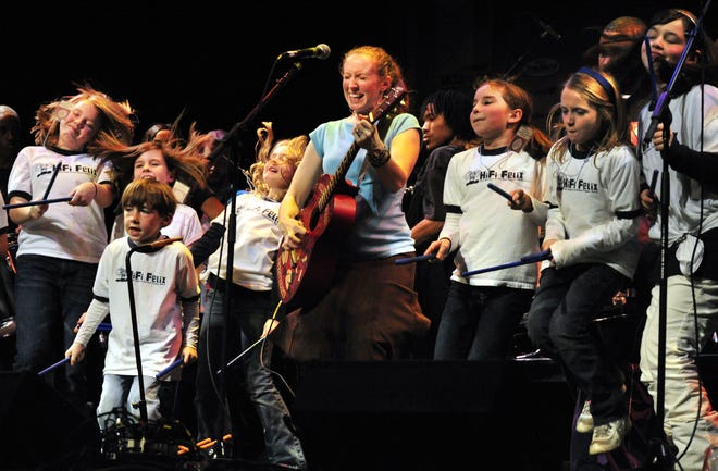 Tara Scheyer and the Mud Puppy Band perform during the 12 Bands of Christmas concert at the Imperial Theatre in 2008.