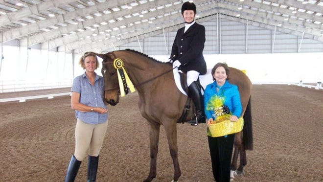 From left: Dru Nagle, Lillian Floyd on Dreamer (AKA Law and Order), and S Level dressage judge Kathy Connely, at the Century Club ride at Jim Brandon Equestrian Center on March 21.