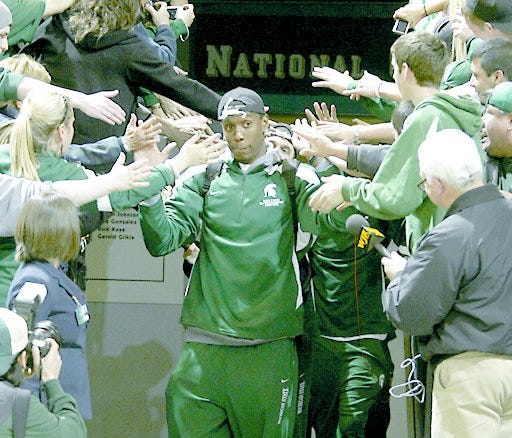 Michigan State senior Raymar Morgan (a McKinley graduate) is greeted by fans gathered for a pep rally at the Breslin Center in East Lansing, Mich., on Sunday after Michigan State returned from its NCAA college basketball tournament win over Tennessee. The Spartans are in the Final Four for the second straight year.