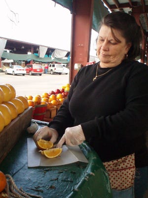 Dottie Yarbrough, a vendor at the Jacksonville Farmer's Market on West Beaver Street for about 30 years, worries for the future of her business after this winter's severe freezes in Florida.