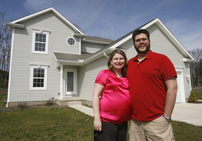 Stephanie and Tim Yates are about to close on a new home in Massillon and have a new baby on the way. They finished their house hunting before the tax credit expires April 30.