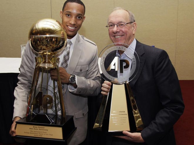 Ohio State junior Evan Turner, left, and Syracuse head coach Jim Boeheim pose with their trophies after being named The Associated Press' college basketball player of the year and coach of the year Friday in Indianapolis.