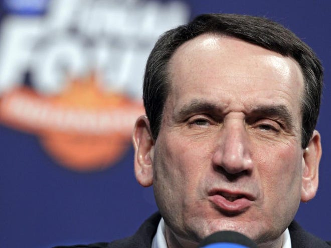 Duke head coach Mike Krzyzewski speaks during an interview session for the men's NCAA Final Four college basketball championship Saturday in Indianapolis.