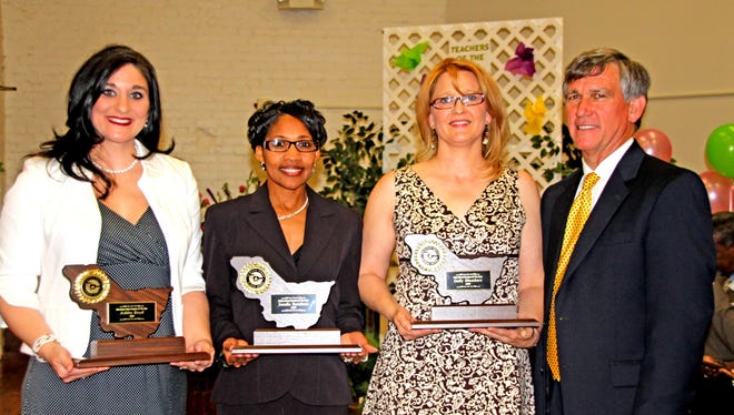 FINEST LOCAL TEACHERS OF 2010...The 2010 District Iberville Parish Teachers of Year are, from left, Ashley Boyd, a fifth grade English and science teacher at Dorseyville Elementary, Elementary School Teacher of Year; Sondia Funchess, a sixth and seventh grade math and science teacher at the Math, Science and Arts Academy-East, Middle School Teacher of Year, and Emily Weathers, a tenth grade English teacher at the Math, Science and Arts Academy-West, Iberville Parish High School Teacher of the Year with Iberville Parish School Superintendent P. Edward Cancienne, Jr. They were named at a ceremony last week.