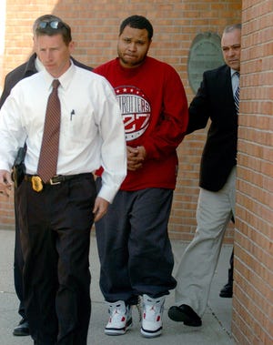 Chad Schaffer is escorted to the Norwich Superior Court from the Norwich Police Department for his arraignment for charges in the 2004 killing 56-year-old Eugene Mallove