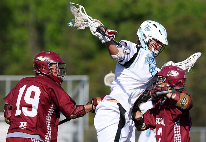 Ponte Vedra's Luke Rokosz (23) runs in to Episcopal's Jeffery Nooney (13) during a district lacrosse game on Wednesday at Nease. By DARON DEAN, daron.dean@staugustine.com