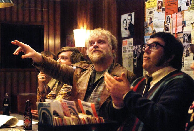 Philip Seymour Hoffman, center, and Nick Frost, right, in a scene from "Pirate Radio."