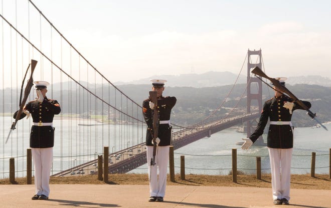 Members of the Marine Corps' Silent Drill Team perform at San Francisco during a national advertising campaign.