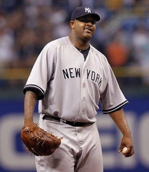 New York Yankees starting pitcher CC Sabathia reacts after giving up his only hit in the eighth inning of a baseball game against the Tampa Bay Rays Saturday, April 10, 2010, in St. Petersburg, Fla. Sabathia took a no-hit bid into the eighth inning Saturday, losing the closest call of his career on a sharp single by former batterymate Kelly Shoppach in the Yankees' 10-0 win. (AP Photo/Mike Carlson)