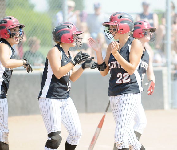 Clinton’s Emily Sell is congratulated after scoring a run during a state tournament game last year. Sell is one of 10 players returning from last year’s Clinton team that reached the state semifinals.