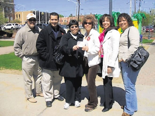 Area residents gathered at Festival Square before taking to the streets to inform the Latino community of the importance of participating in the census. The Census Bureau promises to protect every participant's information.