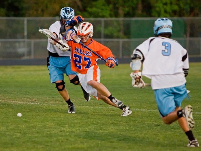 Bolles and Ponte Vedra High lacrosse players mix it up April 9 during the District 2 championship game. After defeating Bolles during the regular season, Ponte Vedra, which had been undefeated, lost the championship 13-8.