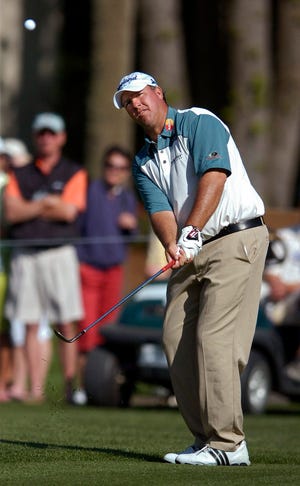 Boo Weekley chips onto green at the ninth hole during the first round of the Verizon Heritage golf tournament, Thursday, April 15, 2010, in Hilton Head Island, S.C. Weekley finished the round at 3 under par. (AP Photo/Stephen Morton)