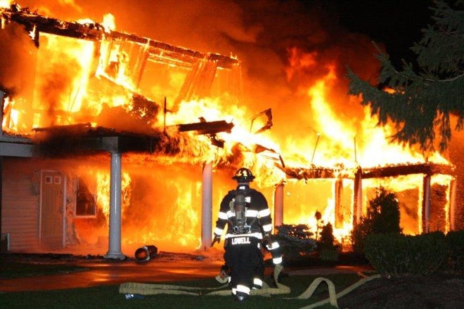 Firefighters battled a major fire Sunday night at the Hopedale Country Club.