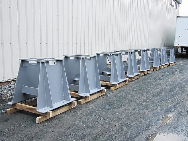 The steel bases manufactured for the World Trade Center memorial by DC Fabrication & Welding weigh 750 pounds each.