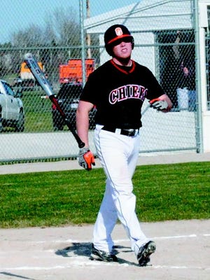 Cheboygan's David Charboneau walks in a run after getting hit by a pitch with the bases loaded.
