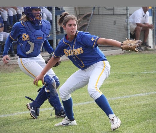 East Ascension senior Rachel LeCoq guns down a runner after fielding a bunt against Assumption in the Spartans’ 5-0 bidistrict win Tuesday in Gonzales.