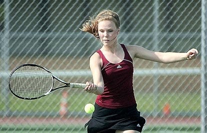 St. Augustine High School tennis player Shannon Healey returns a serve against Ridgeview Tuesday during a regional semifinal. By PETER WILLOTT, peter.willott@staugustine.com