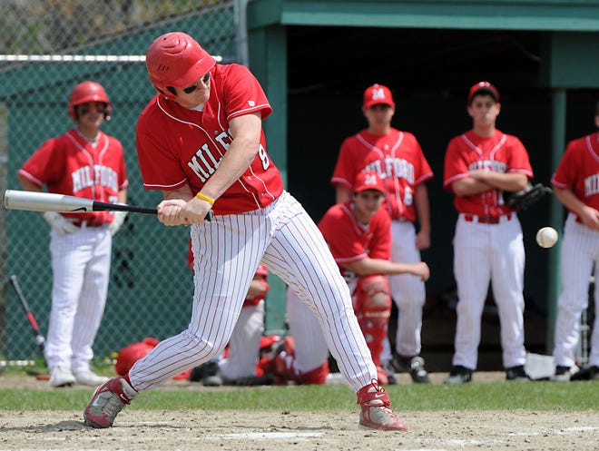 Milford's Matt Ferrelli connetcts for an RBI double during yesterday's loss to St. Peter-Marian.