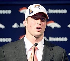 Quarterback Tim Tebow, the Denver Broncos first round draft pick, responds to questions during an NFL football news conference at the Broncos headquarters in Englewood, Colo., on Friday, April 23, 2010. (AP Photo/Ed Andrieski)