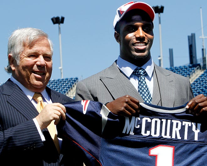 Though the Patriots surprised many by picking Rutgers cornerback Devin McCourty - shown standing with owner Robert Kraft - to fit into an crowded secondary, New England addressed several glaring need in the later rounds.