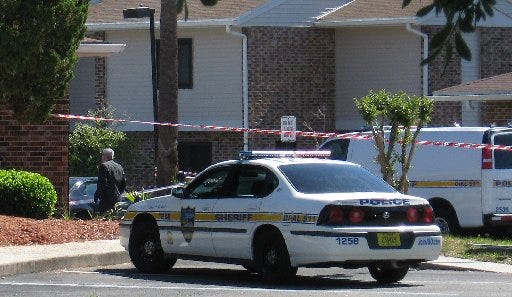 Police suspect foul play in the death of an adult man whose body was discovered about 8:30 a.m. today inside a car at a Jacksonville apartment complex.