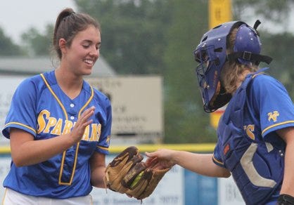 East Ascension senior pitcher Rachel LeCoq receives the ball from junior catcher Tiffany Robinson in the Spartans’ 7-1 win over St. Joseph’s Academy in the regional round of the Class 5A state playoffs. The second-seeded Spartans take on Zachary Friday afternoon at Frasch Park in Sulphur in the quarterfinals.