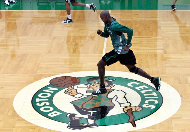 Celtics forward Kevin Garnett runs the court during team practice on Thursday.