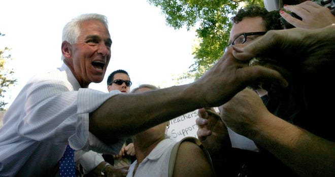 Gov. Charlie Crist shakes hands with supporters after he announced he will run as an independent candidate in his bid for the U.S. senate during a rally in downtown St. Petersburg Thursday.