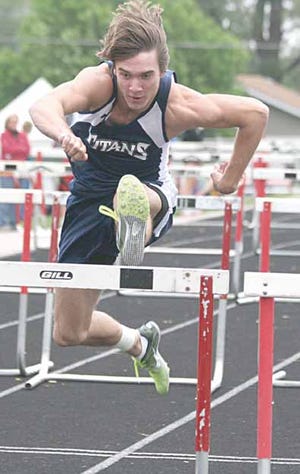 Annawan-Wethersfield's Tanner Ewing led the Titans to a win in the hurdle shuttle at Friday's rain-shortened Moss Relays.