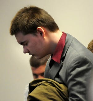John Odgren enters the courtroom for sentencing at Middlesex Superior Court in Woburn Friday, April 30, 2010. Odgren was convicted Thursday of murdering James Alenson in January 2007.