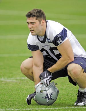 Dallas Cowboys tight end Scott Sicko takes a breather at rookie mini-camp in Irving, Texas, on Friday. The former University of New Hampshire star initially turned down several offers to play for NFL teams after not being selected in April’s draft, saying he wanted to continue his education. That decision created an Internet stir, full of both positive and negative feedback, but Sicko changed his mind this week and decided to sign with the Cowboys.
