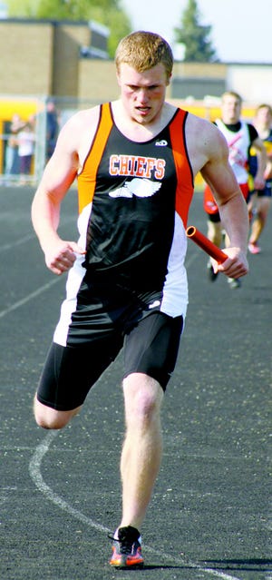 Derek Ferris takes a corner at the Chiefs' Relays on Friday.