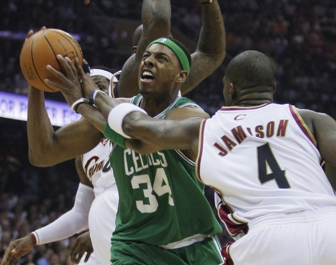 Boston Celtics' Paul Pierce (34) is fouled by Cleveland Cavaliers' Antawn Jamison (5) in the first quarter of Game 2 in the second round of an NBA basketball playoff series Monday.