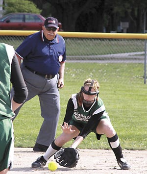 Mendon’s Jessica Doster fields a ball on Monday.