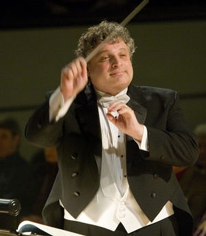 Music Director Steven Karidoyanes conducts the Plymouth Philharmonic Orchestra.