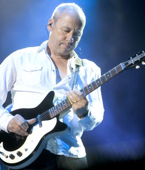 Mark Knopfler performs during a concert at Radio City Music Hall in 2006 in New York.