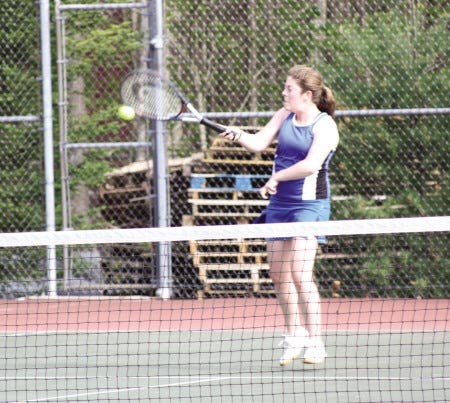Carl Pepin photo
Katie Kelley of the Kennebunk High girls tennis team returns a shot during Monday’s No. 3 singles match against South Portland.