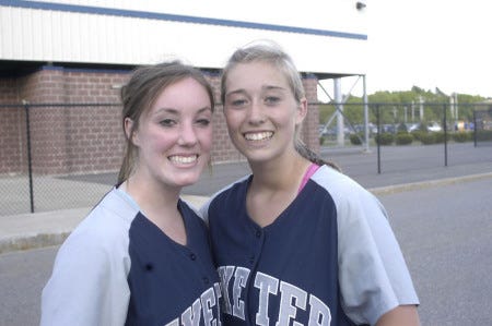 Ken Stejbach photo
Molly Heaney (left) and Megan O’Brien had a reason to smile after the Exeter High School softball team defeated Goffstown on Wednesday for its first win of the season.