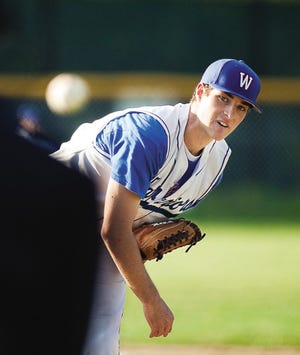 Winnacunnet High School senior Matt Sullivan delivers a pitch during Wednesday's Class L baseball game against Trinity in Hampton.