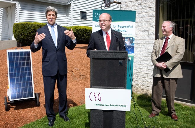 Sen. John Kerry, left, and Rep. Jim McGovern address the employees of Conservation Services Group as company CEO Stephen Cowell, right, who was involved in creating the Home Star Energy Retrofit Act, stands by. Kerry and McGovern were on hand to discuss what the Home Star legislation will mean to the public.