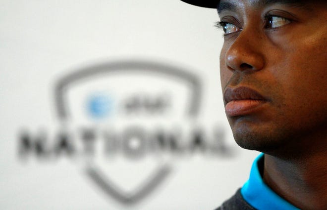 Golfer Tiger Woods listens to a question during a news conference at Aronimink Golf Club, Monday, May 10, 2010, in Newtown Square, Pa. (AP Photo/Matt Slocum)