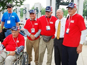 Special to The Times
Rep. Robert Aderholt, second from right, visits with World War II veterans who took part Wednesday in the Gadsden/Etowah County Patriots Association Patriot Flight program.