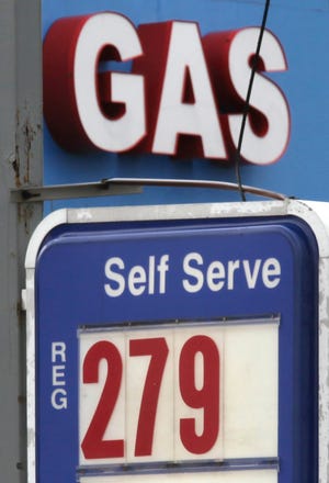 sign in North Randall, Ohio, shows regular self-serve gasoline going for $2.79 per gallon Tuesday at Randall Gas. Amy Sancetta/The Associated Press