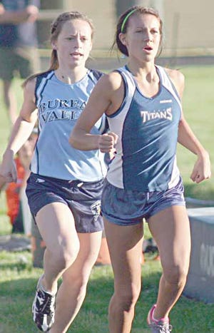 Annawan-Wethersfield’s Claire Pillen, right, and Bureau Valley’s Kim Sanden are seeded first and fourth, respectively, in the 800-meter run.