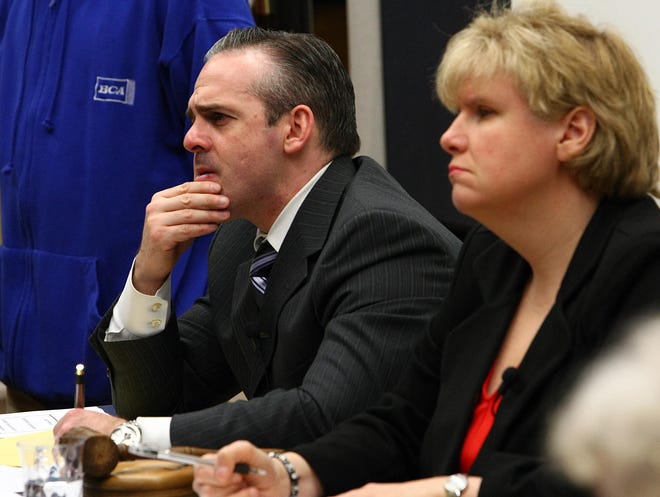 Tim Correira/The Enterprise: shot on Feb 23 2010: WITH STORY: Superintendent of school Dr. Matt Malone and Mayor Linda Balzotti listen during an open forum on the city's heroin epidemic at Tuesday night's school committee meeting.